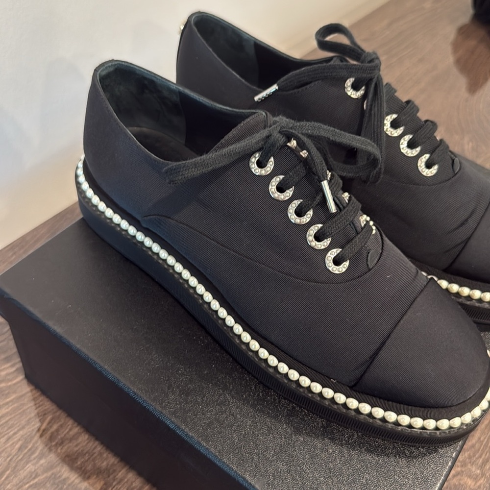 Chanel Black Sneakers with Luxury Design, with pearl details. Authentic
